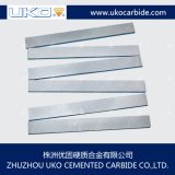 Tungsten carbide wear strips for wood cutting