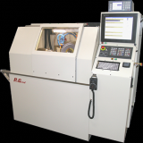 Universal Cylindrical Grinder-Chucking and centered with in- process gauging and workhead mounted dresser.