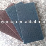 Non-woven abrasive pad