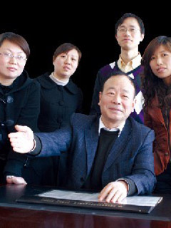 Pan Hongjun, Chairman of the board in Jiangsu Sanling Abrasive Co., Ltd and his team. 