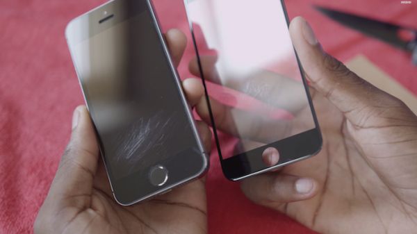 On the right is a 4.7-inch iPhone 6 dummy screen, compared to an iPhone 5S on the left.